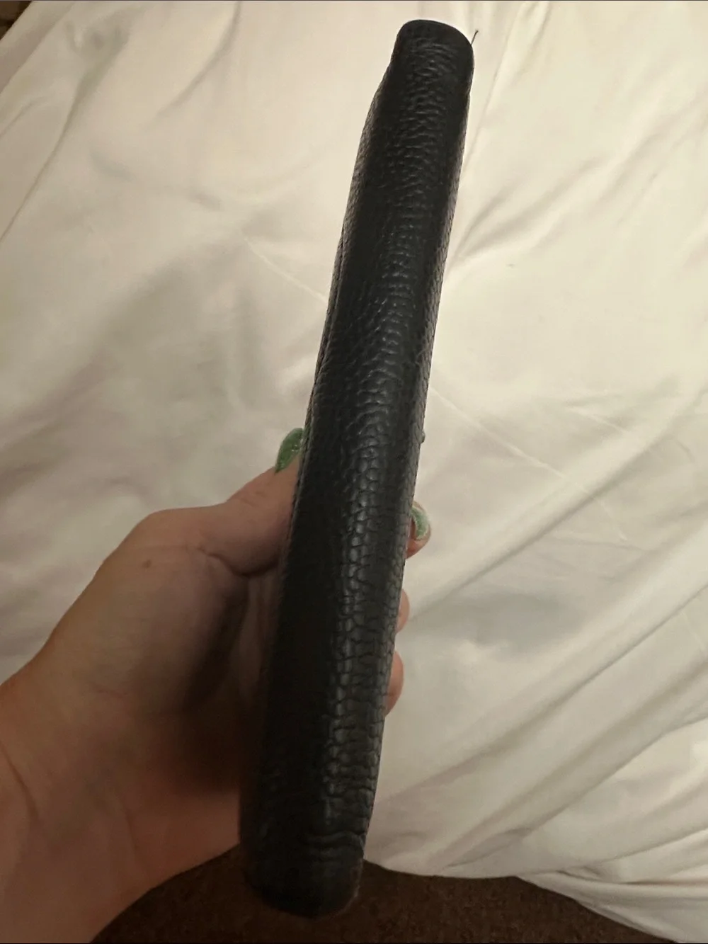 CHANEL Black Quilted CC Caviar Leather wallet.